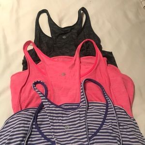 3 Lululemon’s tanks.